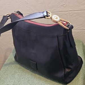 Dooney & Bourke Unique Black Florentine Leather Shoulder Bag with Red Trim